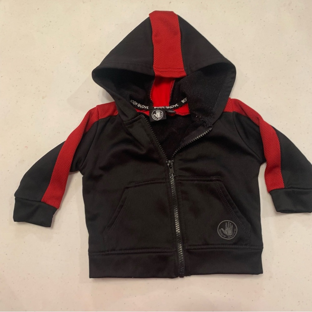Body Glove. Infant 6/9 month. Excellent condition. Lined zip up. Red & black.